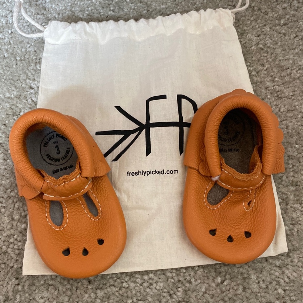 Never worn. Orange freshly picked walkers